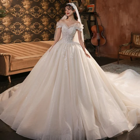 Roman Champagne Bridal Wedding Dresses 2020 Ball Gown Off-The-Shoulder Short Sleeve Backless Appliques Lace Beading Glitter Tulle Cathedral Train Ruffle