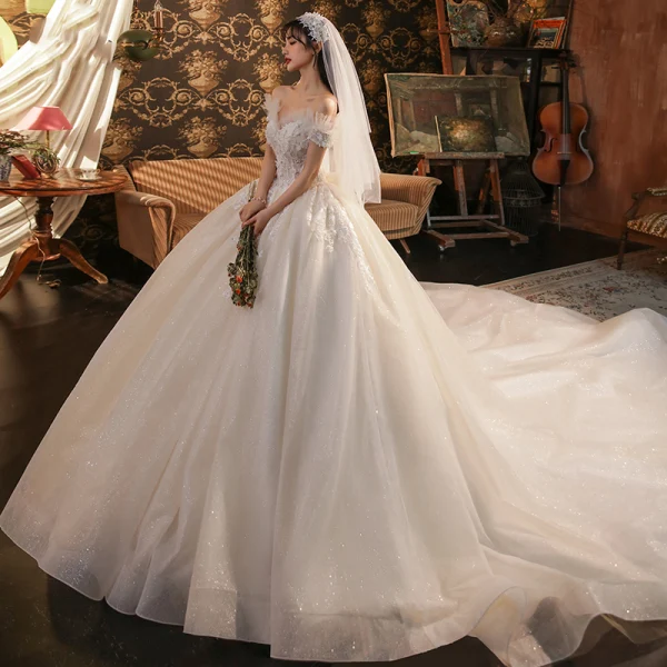 Römisch Champagner Hochzeits Brautkleider / Hochzeitskleider 2020 Ballkleid Off Shoulder Kurze Ärmel Rückenfreies Applikationen Spitze Perlenstickerei Glanz Tülle Kathedrale Schleppe Rüschen