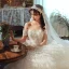 Stunning Champagne Bridal Wedding Dresses 2020 Ball Gown Off-The-Shoulder Short Sleeve Backless Beading Cascading Ruffles Cathedral Train