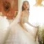 Stunning Champagne Bridal Wedding Dresses 2020 Ball Gown Off-The-Shoulder Short Sleeve Backless Beading Cascading Ruffles Cathedral Train