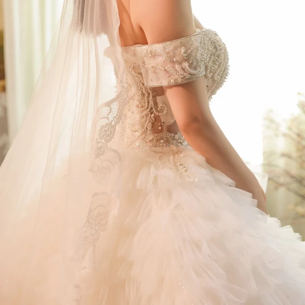 Stunning Champagne Bridal Wedding Dresses 2020 Ball Gown Off-The-Shoulder Short Sleeve Backless Beading Cascading Ruffles Cathedral Train