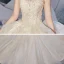 Romantique Champagne La Mariée Robe De Mariée 2020 Princesse Transparentes Encolure Dégagée Sans Manches Dos Nu Appliques En Dentelle Perlage Glitter Tulle Chapel Train Volants