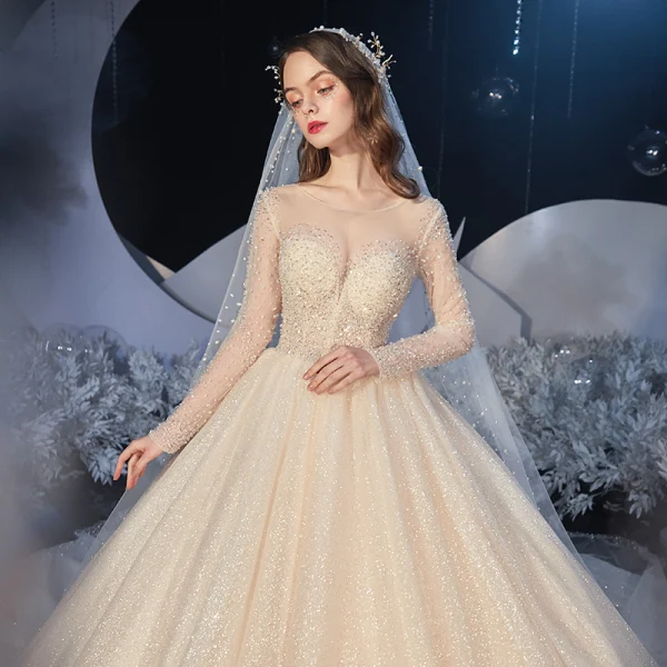 Best Champagne Bridal Wedding Dresses 2020 Ball Gown See-through Scoop Neck Long Sleeve Backless Beading Glitter Tulle Cathedral Train Ruffle
