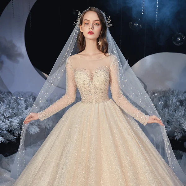 Best Champagne Bridal Wedding Dresses 2020 Ball Gown See-through Scoop Neck Long Sleeve Backless Beading Glitter Tulle Cathedral Train Ruffle