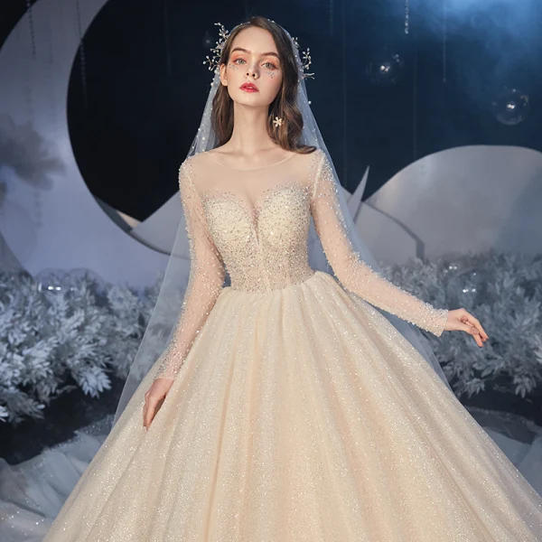 Best Champagne Bridal Wedding Dresses 2020 Ball Gown See-through Scoop Neck Long Sleeve Backless Beading Glitter Tulle Cathedral Train Ruffle
