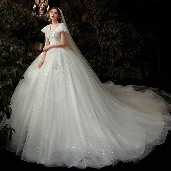 Chic / Belle Ivoire La Mariée Robe De Mariée 2020 Empire V-Cou Manches Courtes Dos Nu Perlage Paillettes Cathedral Train Volants