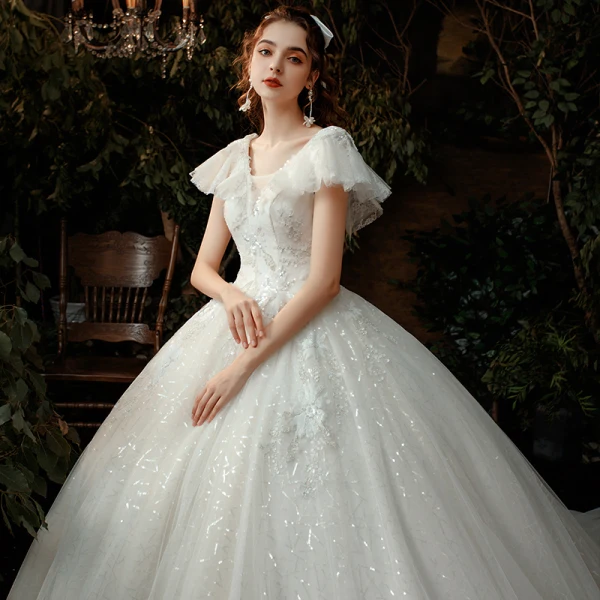 Chic / Belle Ivoire La Mariée Robe De Mariée 2020 Empire V-Cou Manches Courtes Dos Nu Perlage Paillettes Cathedral Train Volants