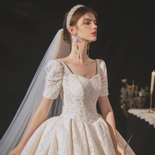 Vintage / Retro Champagne Bridal Wedding Dresses 2020 Ball Gown Square Neckline Short Sleeve Backless Glitter Appliques Lace Cathedral Train Ruffle