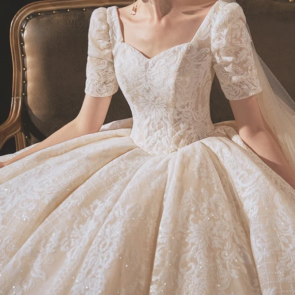 Vintage / Retro Champagne Bridal Wedding Dresses 2020 Ball Gown Square Neckline Short Sleeve Backless Glitter Appliques Lace Cathedral Train Ruffle