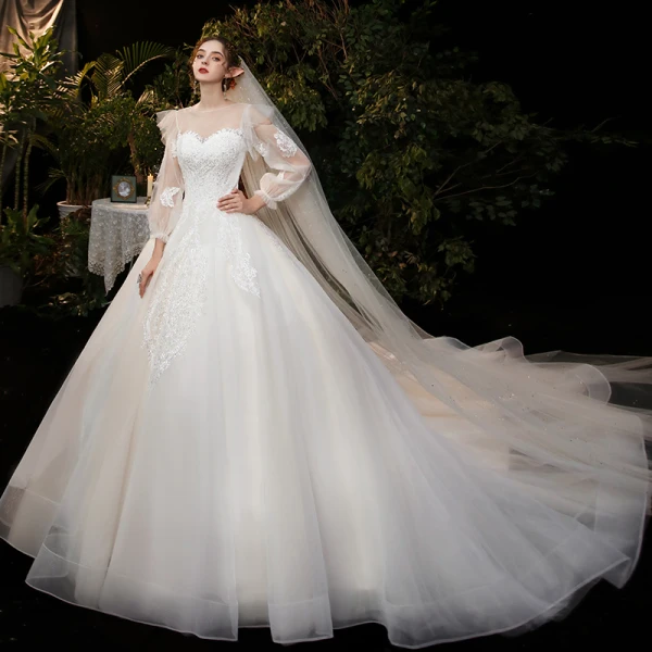 Victorian Style Champagne Bridal Wedding Dresses 2020 Ball Gown See-through Scoop Neck Puffy Long Sleeve Backless Appliques Sequins Cathedral Train Ruffle