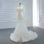Luxe Blanche Transparentes La Mariée Robe De Mariée 2020 Trompette / Sirène Col Haut Manches Longues Fait main Perlage Tribunal Train