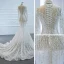 Luxe Blanche Transparentes La Mariée Robe De Mariée 2020 Trompette / Sirène Col Haut Manches Longues Fait main Perlage Tribunal Train