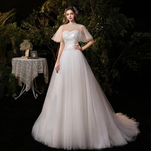 Affordable Champagne Outdoor Garden Wedding Dresses 2020 A Line Princess See Through High Neck Short Sleeve Backless Sequins Floor Length Long Ruffle