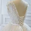 Luxe Ivoire La Mariée Robe De Mariée 2020 Robe Boule Transparentes Col v profond Sans Manches Dos Nu Appliques En Dentelle Perlage Perle Noeud Ceinture