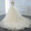 Luxe Ivoire La Mariée Robe De Mariée 2020 Robe Boule Transparentes Col v profond Sans Manches Dos Nu Appliques En Dentelle Perlage Perle Noeud Ceinture