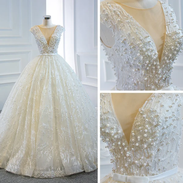 Luxe Ivoire La Mariée Robe De Mariée 2020 Robe Boule Transparentes Col v profond Sans Manches Dos Nu Appliques En Dentelle Perlage Perle Noeud Ceinture