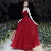 Sexy Burgundy Prom Dresses 2020 A-Line / Princess Spaghetti Straps Deep V-Neck Sleeveless Beading Glitter Tulle Sash Floor-Length / Long Ruffle Backless Formal Dresses