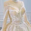 Luxury / Gorgeous Champagne Bridal Wedding Dresses 2020 Ball Gown See-through Scoop Neck Long Sleeve Appliques Lace Sequins Beading Chapel Train Ruffle