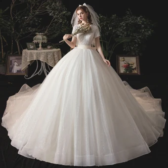 Vintage Originale Ivoire La Mariée Robe De Mariée 2020 Robe Boule V Cou Manches Courtes Dos Nu Perlage Glitter Tulle Ceinture Chapel Train Volants