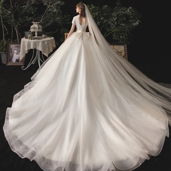 Vintage / Retro Ivory Bridal Wedding Dresses 2020 Ball Gown V-Neck Short Sleeve Backless Beading Glitter Tulle Sash Chapel Train Ruffle