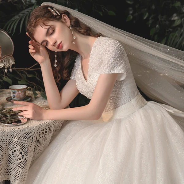 Vintage / Retro Ivory Bridal Wedding Dresses 2020 Ball Gown V-Neck Short Sleeve Backless Beading Glitter Tulle Sash Chapel Train Ruffle