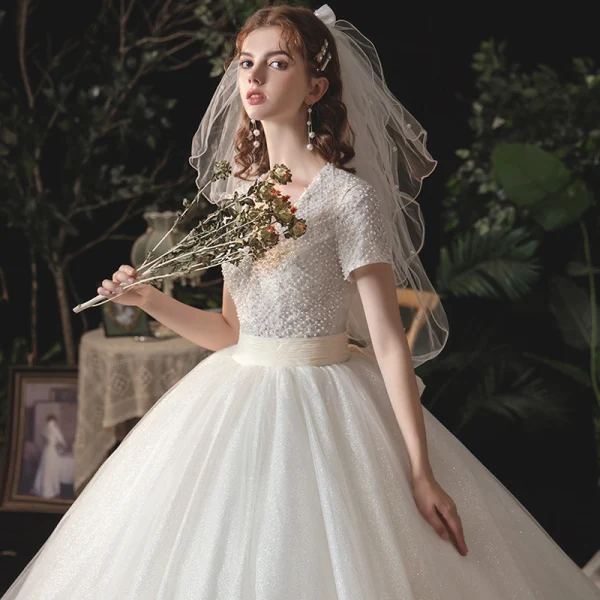 Vintage / Retro Ivory Bridal Wedding Dresses 2020 Ball Gown V-Neck Short Sleeve Backless Beading Glitter Tulle Sash Chapel Train Ruffle