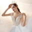 Romantique Blanche La Mariée Robe De Mariée 2020 Robe Boule Transparentes Encolure Dégagée Manches Courtes Dos Nu Perlage Glitter Tulle Cathedral Train Volants