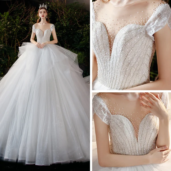 Romantique Blanche La Mariée Robe De Mariée 2020 Robe Boule Transparentes Encolure Dégagée Manches Courtes Dos Nu Perlage Glitter Tulle Cathedral Train Volants