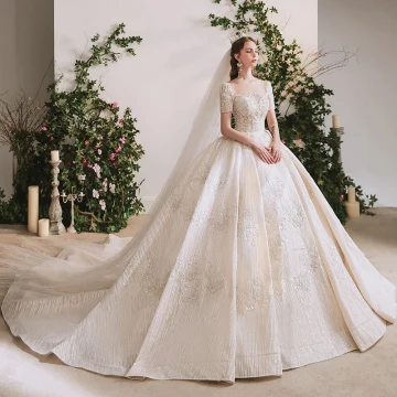 Luxe Champagne La Mariée Robe De Mariée 2020 Robe Boule Transparentes Encolure Dégagée Manches Courtes Dos Nu Fait Main Perlage Paillettes Glitter Tulle Cathedral Train Volants