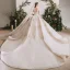 Luxe Champagne La Mariée Robe De Mariée 2020 Robe Boule Transparentes Encolure Dégagée Manches Courtes Dos Nu Fait main Perlage Paillettes Glitter Tulle Cathedral Train Volants