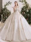 Luxe Champagne La Mariée Robe De Mariée 2020 Robe Boule Transparentes Encolure Dégagée Manches Courtes Dos Nu Fait main Perlage Paillettes Glitter Tulle Cathedral Train Volants