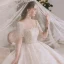 Luxe Champagne La Mariée Robe De Mariée 2020 Robe Boule Transparentes Encolure Dégagée Manches Courtes Dos Nu Fait main Perlage Paillettes Glitter Tulle Cathedral Train Volants