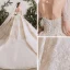 Luxe Champagne La Mariée Robe De Mariée 2020 Robe Boule Transparentes Encolure Dégagée Manches Courtes Dos Nu Fait main Perlage Paillettes Glitter Tulle Cathedral Train Volants