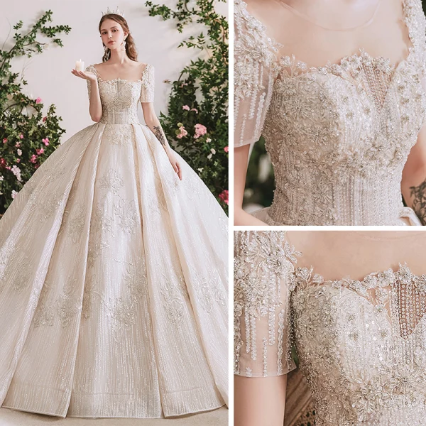 Luxe Champagne La Mariée Robe De Mariée 2020 Robe Boule Transparentes Encolure Dégagée Manches Courtes Dos Nu Fait main Perlage Paillettes Glitter Tulle Cathedral Train Volants