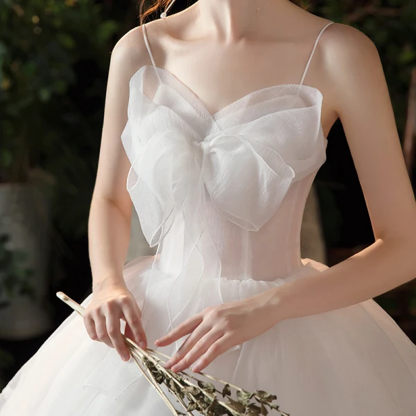 Modest / Simple White Bridal Wedding Dresses 2020 Ball Gown Spaghetti Straps Sleeveless Backless Bow Chapel Train Ruffle
