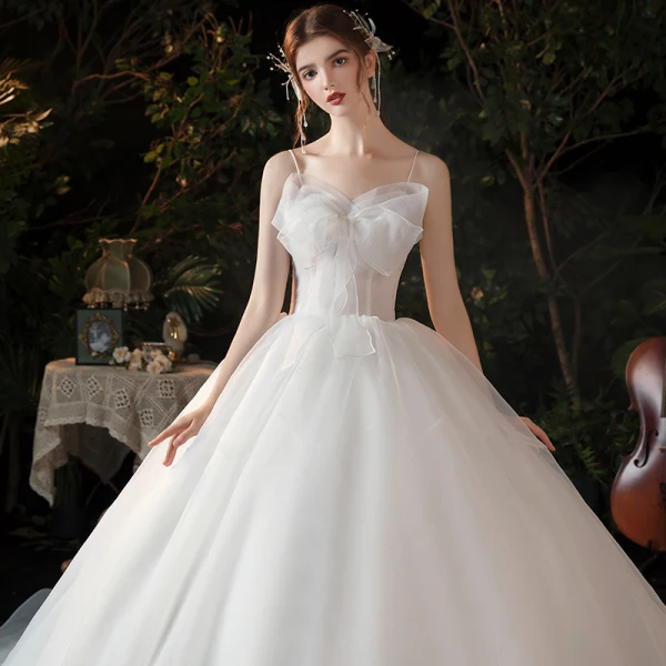 Modest / Simple White Bridal Wedding Dresses 2020 Ball Gown Spaghetti Straps Sleeveless Backless Bow Chapel Train Ruffle