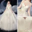 Vintage / Originale Ivoire La Mariée Robe De Mariée 2020 Robe Boule Transparentes Col Haut 3/4 Manches Dos Nu Appliques En Dentelle Paillettes Perlage Cathedral Train Volants