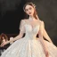 Style Victorien Ivoire La Mariée Robe De Mariée 2020 Robe Boule Transparentes Col Haut Gonflée Manches Courtes Dos Nu Appliques En Dentelle Perlage Gland Cathedral Train Volants