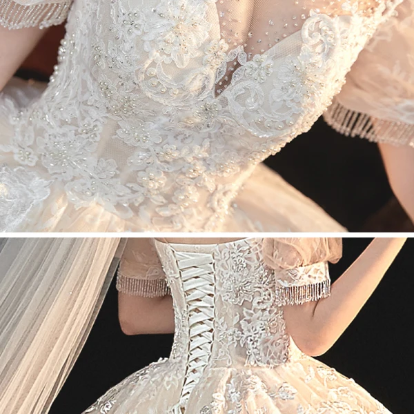 Style Victorien Ivoire La Mariée Robe De Mariée 2020 Robe Boule Transparentes Col Haut Gonflée Manches Courtes Dos Nu Appliques En Dentelle Perlage Gland Cathedral Train Volants