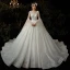 Romantique Champagne Robe De Mariée 2020 Robe Boule Transparentes Encolure Dégagée Manches de cloche Dos Nu Perlage Glitter Tulle Cathedral Train Volants