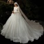 Romantique Champagne Robe De Mariée 2020 Robe Boule Transparentes Encolure Dégagée Manches de cloche Dos Nu Perlage Glitter Tulle Cathedral Train Volants