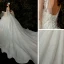 Romantique Champagne Robe De Mariée 2020 Robe Boule Transparentes Encolure Dégagée Manches de cloche Dos Nu Perlage Glitter Tulle Cathedral Train Volants