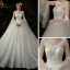 Romantique Champagne Robe De Mariée 2020 Robe Boule Transparentes Encolure Dégagée Manches de cloche Dos Nu Perlage Glitter Tulle Cathedral Train Volants