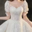 Luxury / Gorgeous White Bridal Wedding Dresses 2020 Ball Gown See-through Scoop Neck Puffy Short Sleeve Backless Appliques Lace Beading Cathedral Train Ruffle
