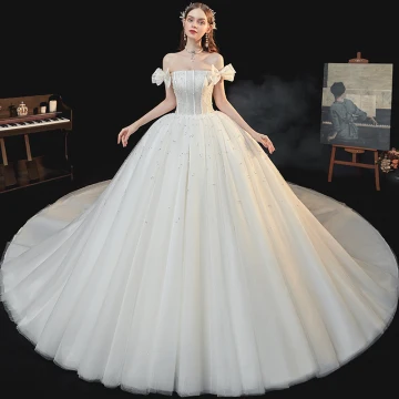 Het Beste Witte Bruids Trouwjurken 2020 Baljurk Uit De Schouder Strik Korte Mouwen Ruglooze Kralen Parel Glans Tule Cathedral Train Ruche