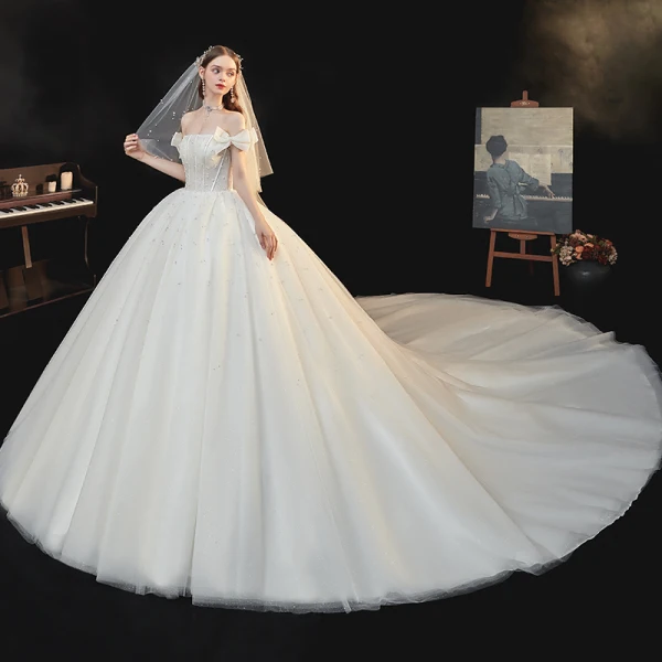 Best White Bridal Wedding Dresses 2020 Ball Gown Off-The-Shoulder Bow Short Sleeve Backless Beading Pearl Glitter Tulle Cathedral Train Ruffle