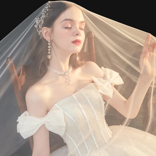 Best White Bridal Wedding Dresses 2020 Ball Gown Off-The-Shoulder Bow Short Sleeve Backless Beading Pearl Glitter Tulle Cathedral Train Ruffle