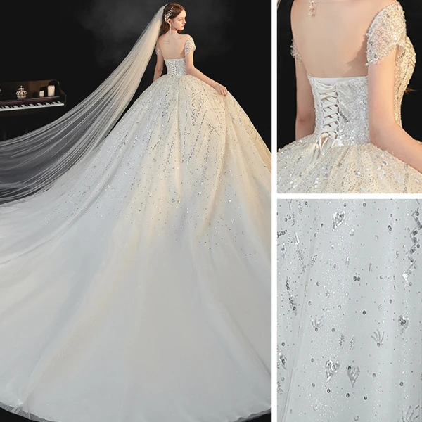 Luxe Blanche La Mariée Robe De Mariée 2020 Robe Boule Transparentes Encolure Dégagée Manches Courtes Dos Nu Paillettes Perlage Glitter Tulle Cathedral Train Volants