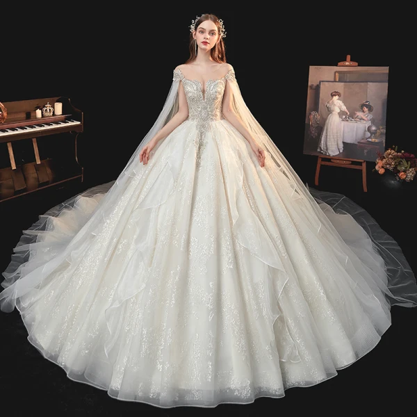 Luxe Champagne La Mariée Robe De Mariée 2020 Robe Boule Transparentes Encolure Dégagée Manches Courtes Dos Nu Glitter Tulle Paillettes Perlage Cathedral Train Volants