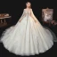 Luxe Champagne La Mariée Robe De Mariée 2020 Robe Boule Transparentes Encolure Dégagée Manches Courtes Dos Nu Glitter Tulle Paillettes Perlage Cathedral Train Volants